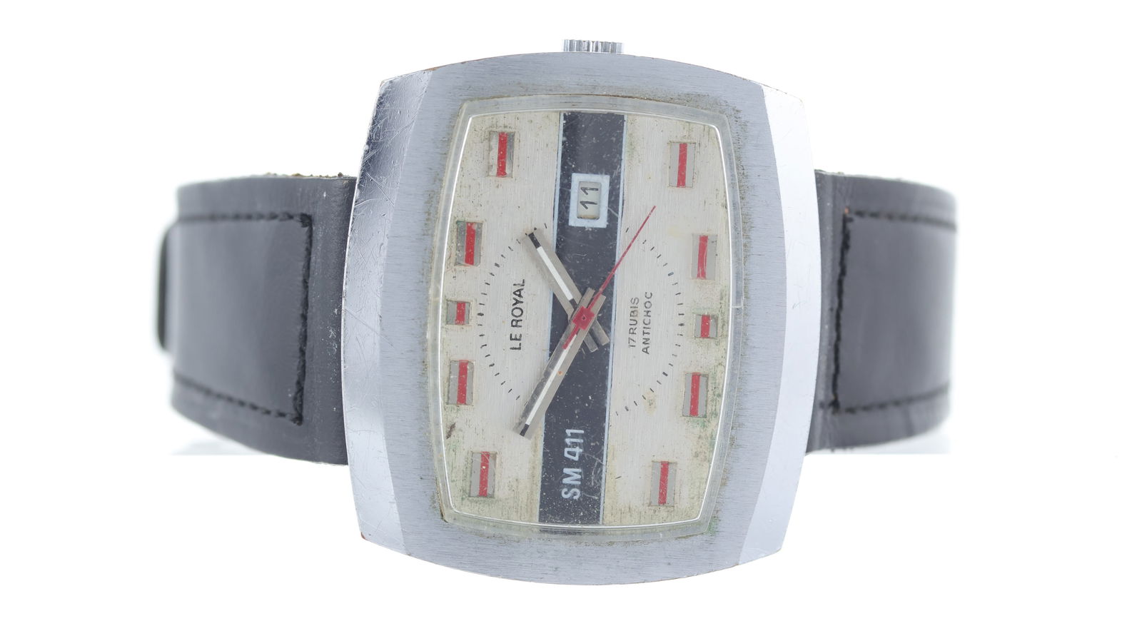 *To Be Sold Without Reserve* Le Royal TV Case Manual Wind Wristwatch Circa 1970's: Le Royal TV Case Manual Wind Wristwatch Circa 1970's, Silver dial with black stripe, red baton hour markers, date aperture at 3 o'clock, 41mm stainless steel case, black strap, not running unable to
