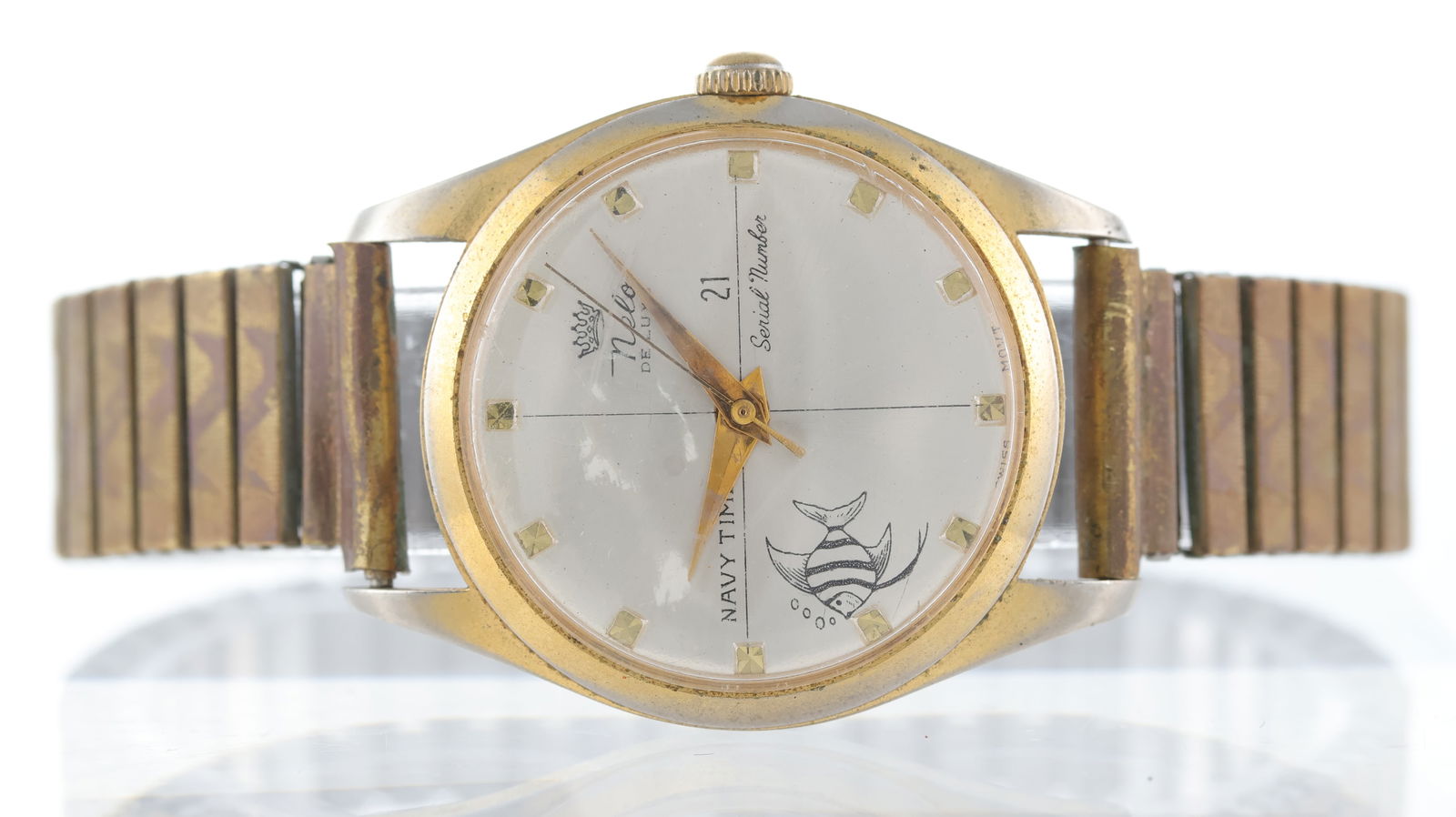Nelo Navy Time *no reserve*: Brand: Nelo Model Name: Navy Time Movement type: Manual Wind Dial shape: Circular Dial colour: siler Dial features: quarted dial, fish emblem, block hour markers Case size: 34mm Case
