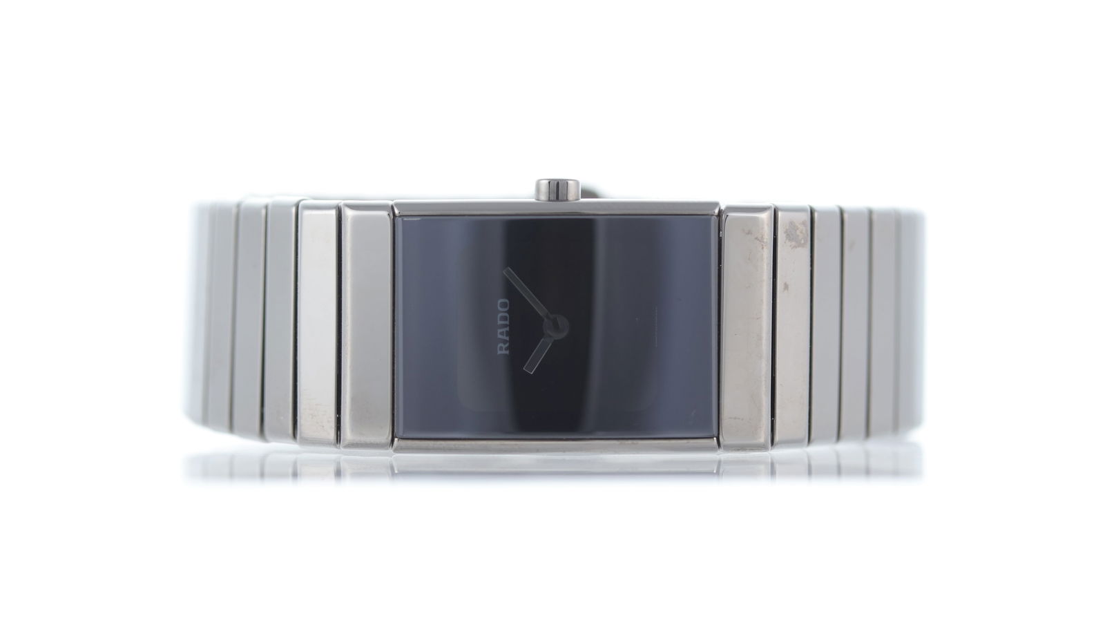 Rado Ceramica Ref 963.0827.3: Brand: Rado Model Name: Ceramica Reference: 963.0827.3 Movement type: Quartz Dial shape: Rectangular Dial colour: Black Case size: 19MM Case material: Black Ceramic Case back material: Black
