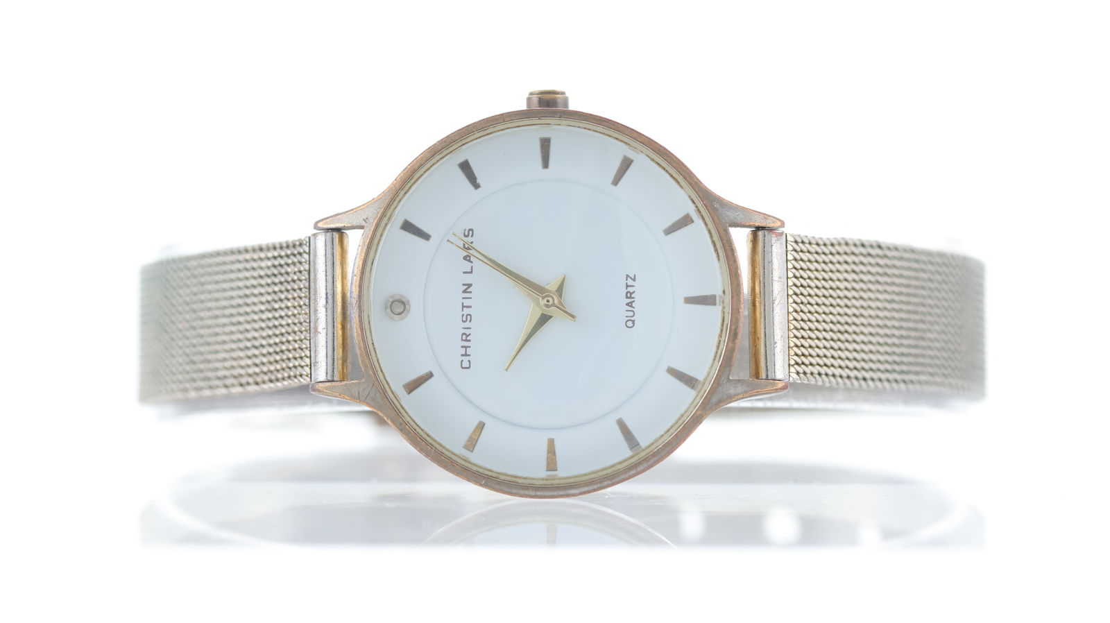 *To Be Sold Without Reserve* Christian Lars Quartz Watch: Christian Lars Quartz Watch, circular white dial with baton hour markers, 30mm gold plated case, stainless steel case back, steel bracelet, not running.