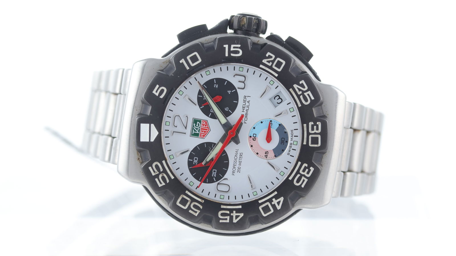 Tag Heuer Formula 1 Ref CAC1111-0: Brand: Tag Heuer Model Name: Formula 1 Reference: CAC1111-0 Movement type: Quartz Dial shape: Circular Dial colour: White Dial features: Baton and arabic numerals, quickset date aperture at
