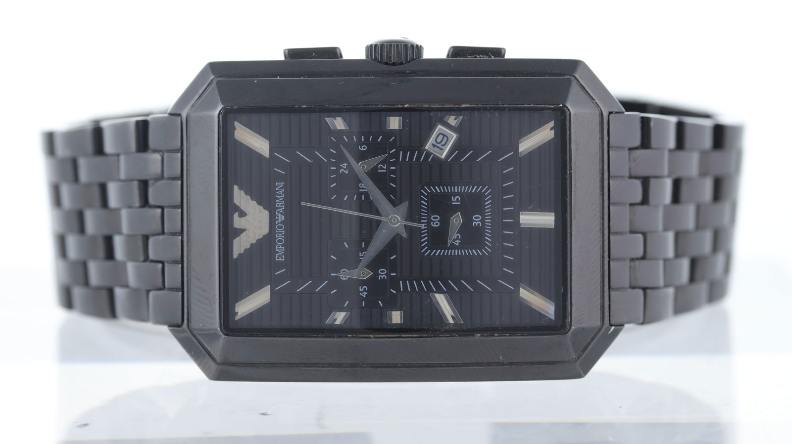 *To Be Sold Without Reserve* Emporio Armani Chronograph DLC Coated Wristwatch: *To Be Sold Without Reserve* Emporio Armani Chronograph DLC Coated Wristwatch, black dial with baton hour markers, three subsidiary dials, quickset date aperture at 4 o'clock, 33mm by 43mm DLC coated