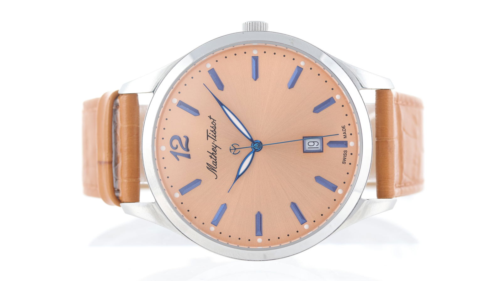 Mathey-Tissot Dress Watch with Box and Papers: Brand: Mathey-Tissot Model Name: Dress Watch Movement type: Quartz Papers: Undated Dial shape: Circular Dial colour: Salmon Dial features: Blue hands and hour markers, quickset date aperture