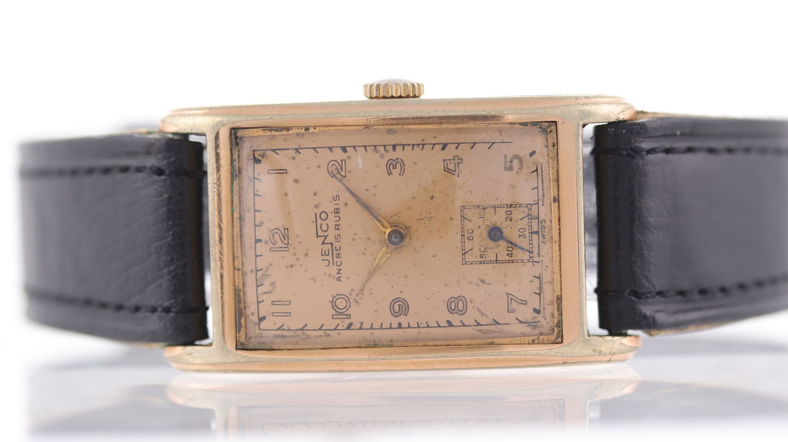 Vintage Jenco Tank Manual Wind: Brand: Jenco Model Name: Tank Movement: Manual Wind Dial shape: Rectangular Dial colour: Champagne Dial features: Patina dial. Sub seconds. Arabic numeral hour markers. Case size: 22mm Case