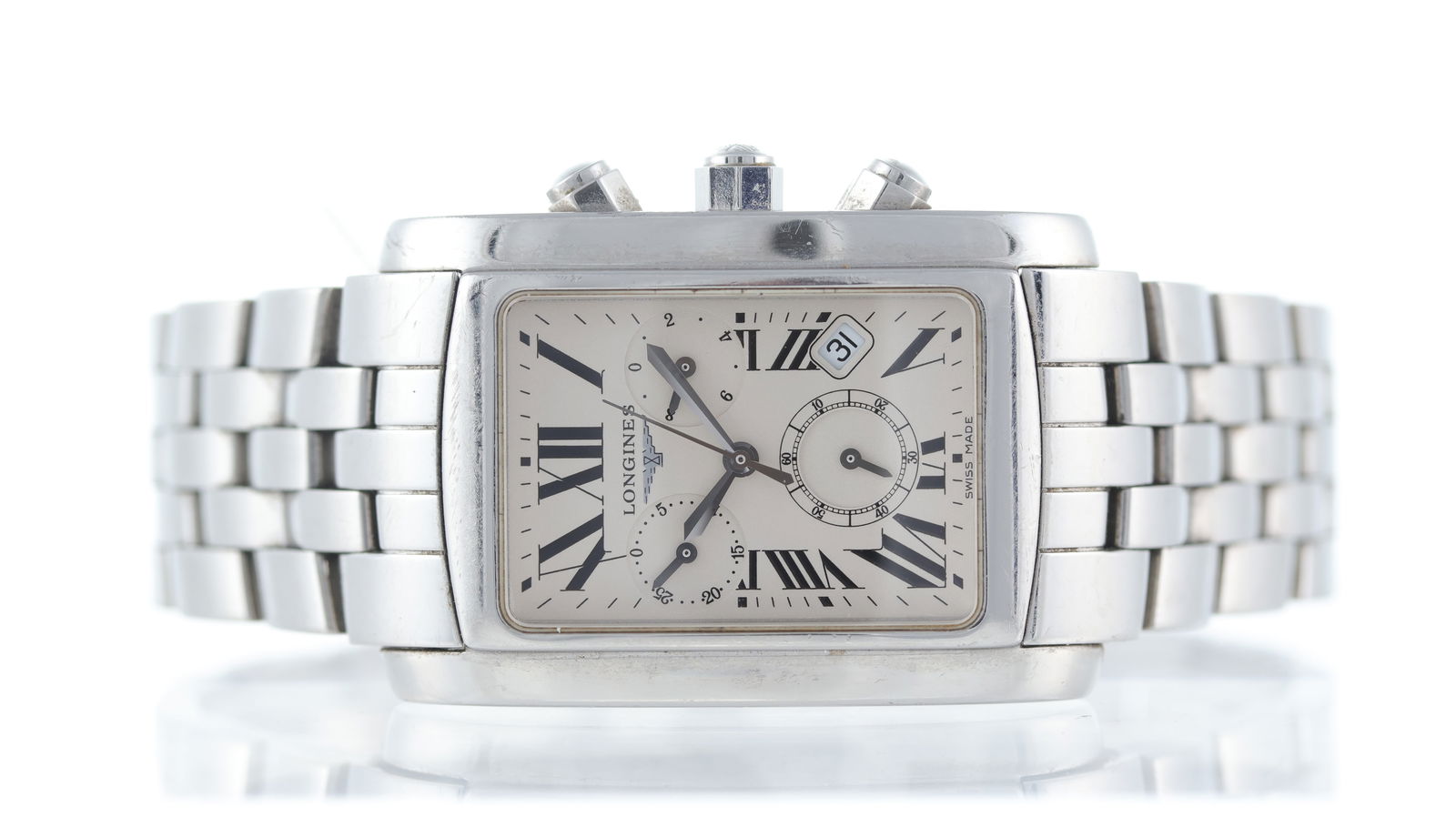 Longines Dolcevita Ref L5.680.4 With Papers 2009: Brand: Longines Model Name: Dolcevita Reference: L5.680.4 Movement type: Quartz Papers: Warranty Papers Dial shape: Rectangular Dial colour: Off-white Dial features: Black roman numerals.