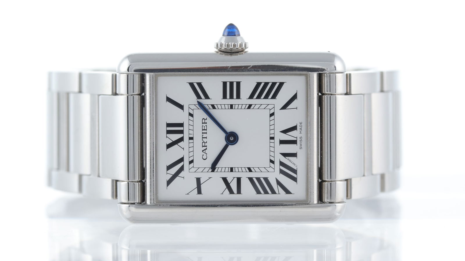 Cartier Tank Must Ref 4323 / WSTA0106: Brand: Cartier Model Name: Tank Reference: 4323 Movement type: Quartz Dial shape: Rectangular Dial colour: White Dial features: Roman numerals, blue steel hands Case size: 25.5mm Case material: Stainl