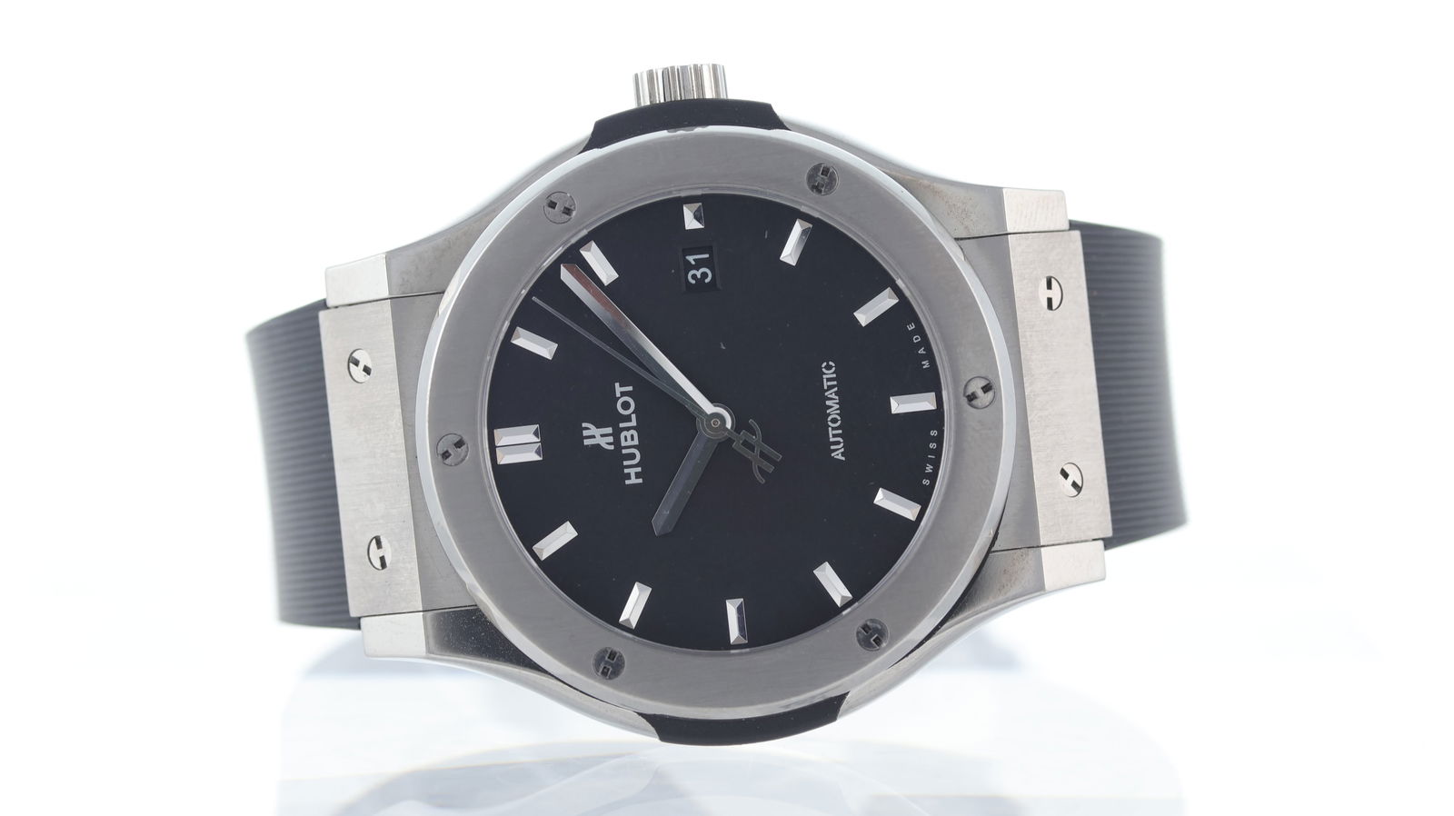 Hublot Classic Fusion Titanium with Box: Brand: Hublot Model Name: Classic Fusion Movement type: Automatic Movement calibre: Hublot HUB 11 Box: Full Box Dial shape: Circular Dial colour: Black Dial features: Matte dial. Faceted hour markers.