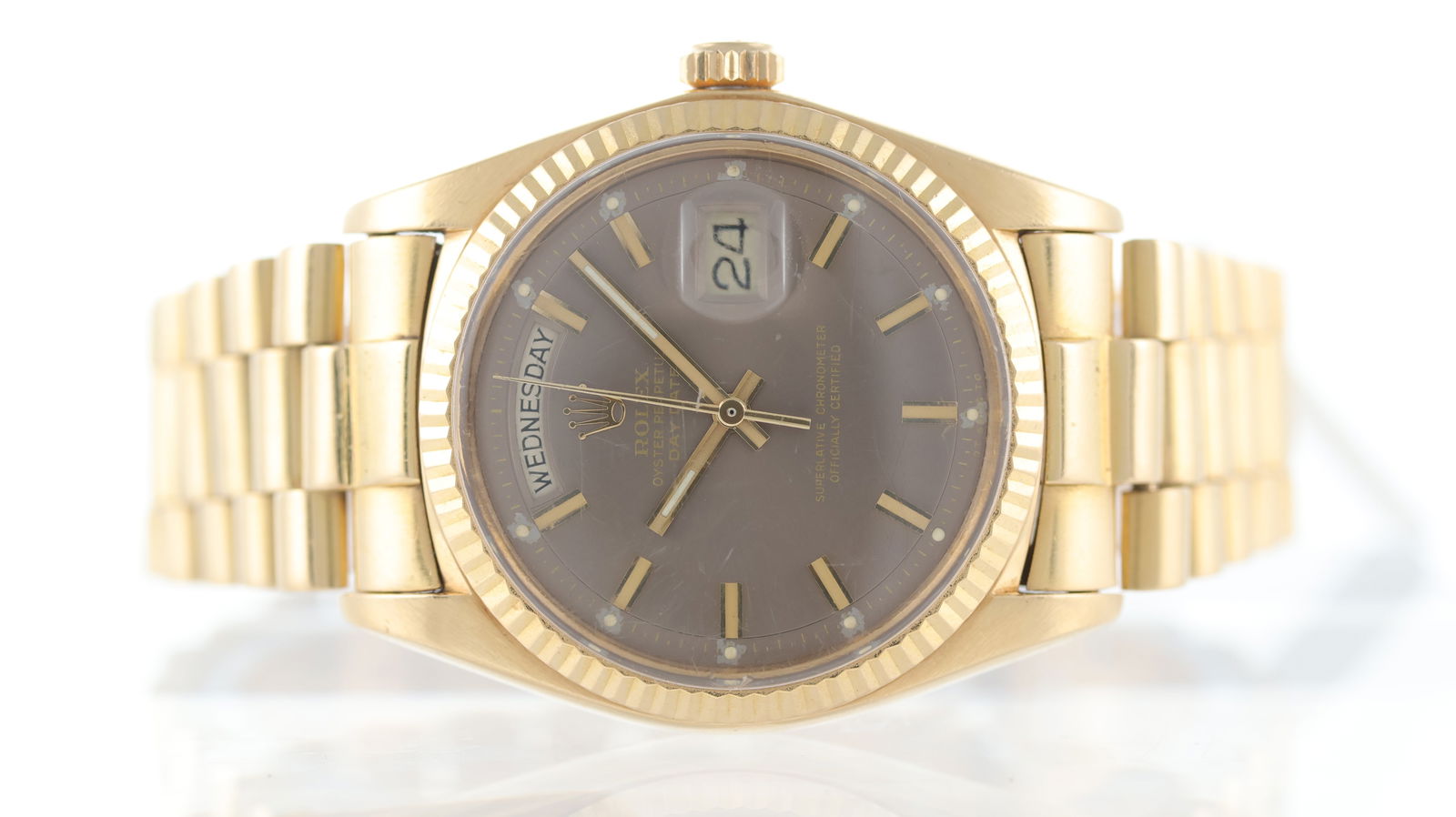 Rolex Day-Date 18ct yellow gold Ref 1803 circa 1973: Brand: Rolex Model Name: Day-Date Reference: 1803 Movement type: Automatic Movement calibre: Rolex 1556 Year: circa 1973 Dial shape: Circular Dial colour: Taupe Dial features: Pie Pan 'Wide Boy' sigma