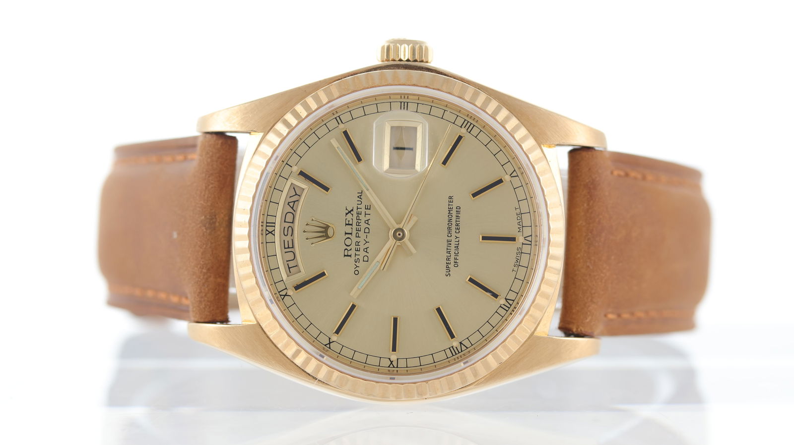 Rolex Day-Date 18ct yellow gold Ref 18038 Circa 1979: Brand: Rolex Model Name: Day-Date Reference: 18038 Movement type: Automatic Movement calibre: Rolex 3055 Year: Circa 1979 Dial shape: Circular Dial colour: Silver Dial features: Baton hour markers, Ro
