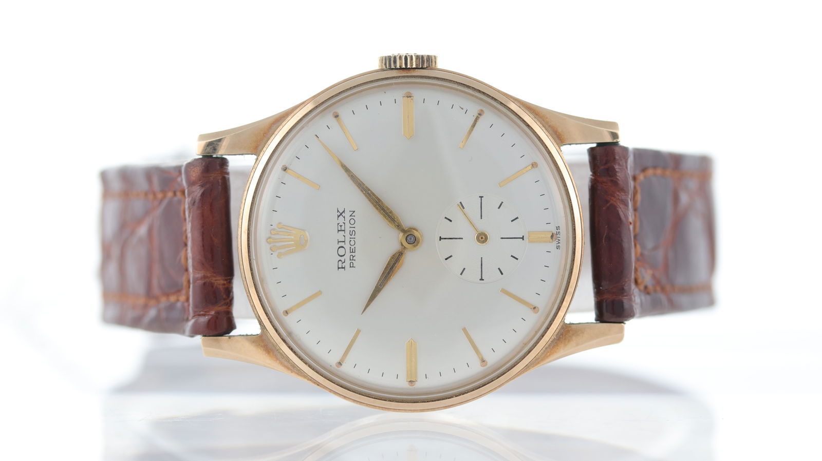 Vintage Rolex Precision 9ct Gold Dennison Case Circa 1960: Brand: Rolex Model Name: Precision Movement type: Manual Wind Movement calibre: Rolex 1200 Year: Circa 1960 Dial shape: Circular Dial colour: White Dial features: Gold baton hour markers, subsidiary s