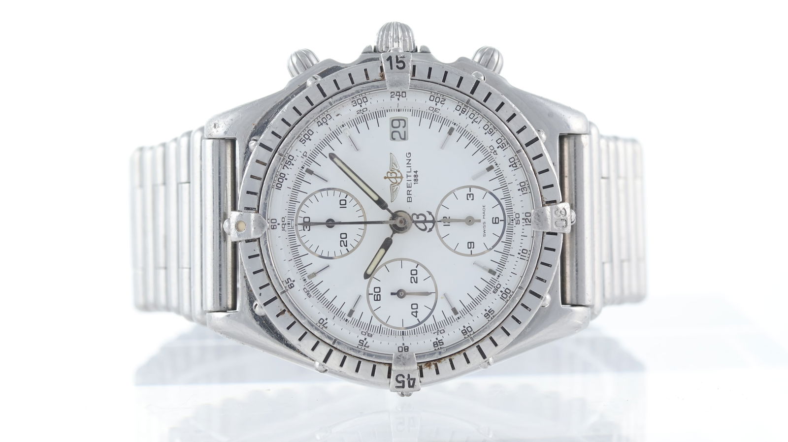 Breitling Chronomat Ref A13050: Brand: Breitling Model Name: Chronomat Reference: A13050 Movement type: Automatic Dial shape: Circular Dial colour: White Dial features: Silver baton hour markers. Date aperture at 3 o'clock Bezel: Un