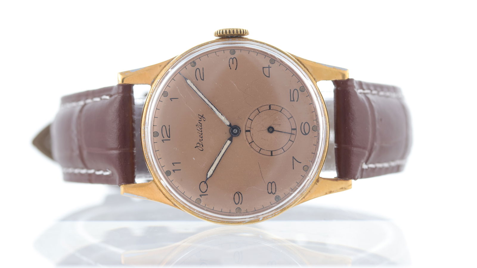 Breitling Vintage Dress Watch Ref 153 Circa 1950's: Brand: Breitling Model Name: Vintage Dress Watch Reference: 153 Movement type: Manual Wind Movement features: Un-signed Swiss Made movement Year: Circa 1950's Dial shape: Circular Dial colour: Copper