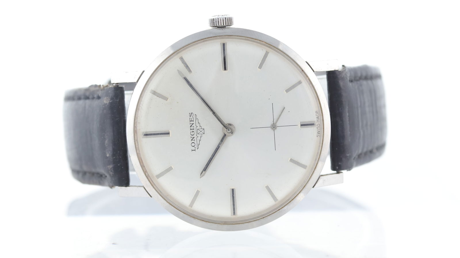 Vintage Longines Dress Watch Manual Wind: Brand: Longines Model Name: Vintage Movement type: Manual Wind Dial shape: Circular Dial colour: Silver Dial features: Applied baton hour markers. Sub seconds. Case size: 35mm Case material: Stainless