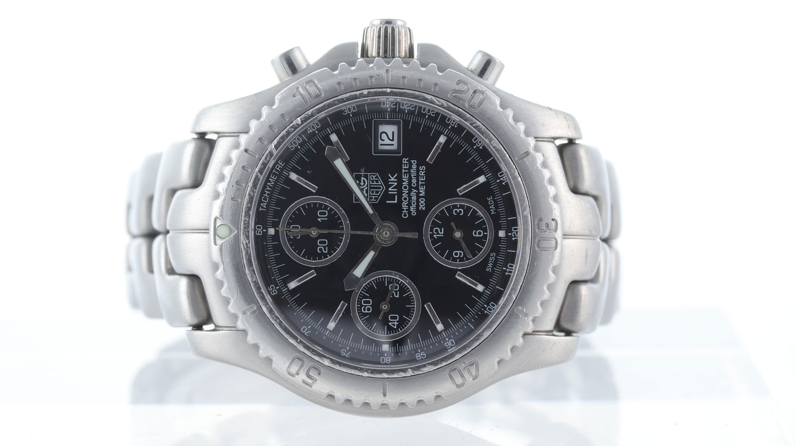 Tag Heuer Link Professional Automatic Chronograph Ref CT5111 with Box: Brand: Tag Heuer Model Name: Link Professional Reference: CT5111 Movement type: Automatic Box: Service Case Dial shape: Circular Dial colour: Black Dial features: Silver baton hour markers. Quick set