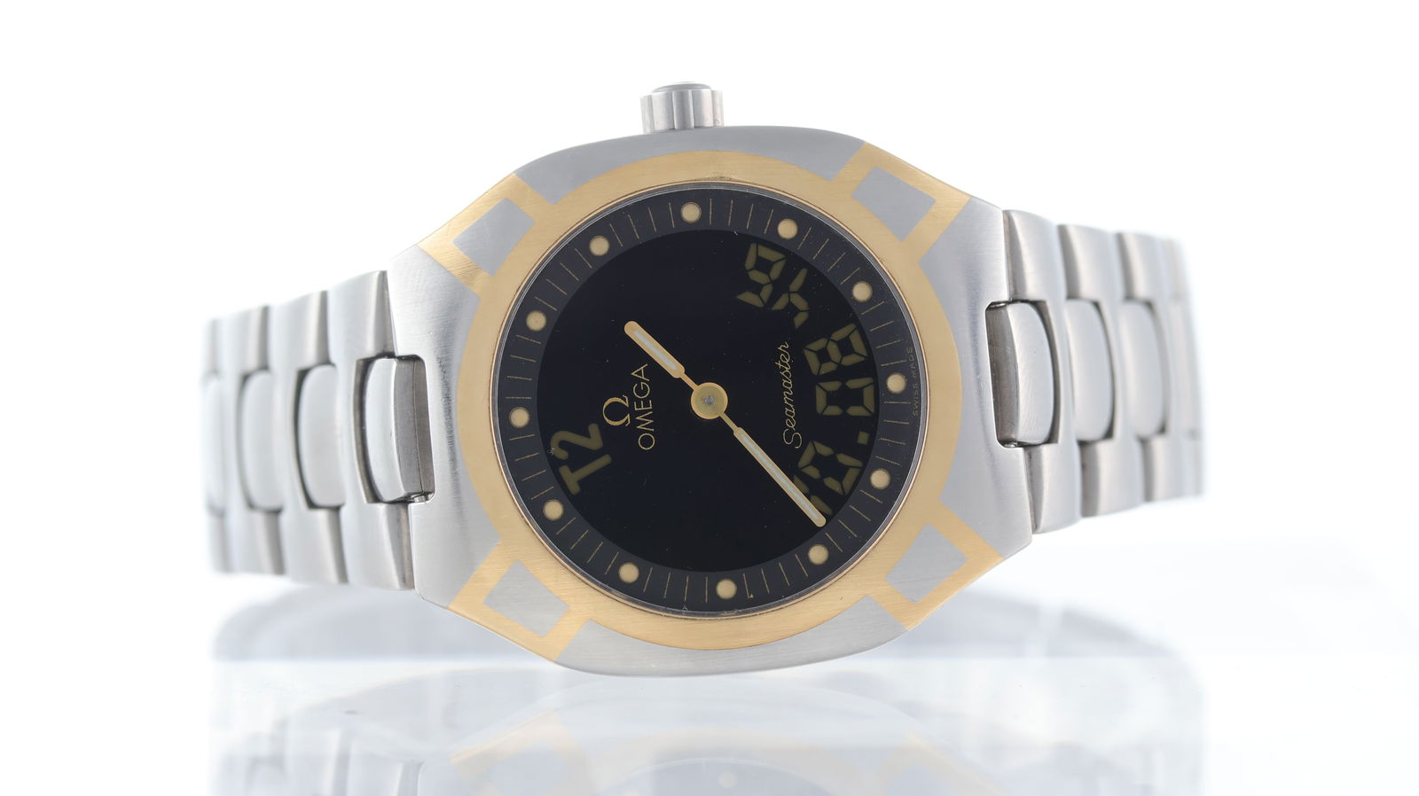 Omega Seamaster Polaris Digital: Brand: Omega Model Name: Seamaster Polaris Movement type: Quartz Dial shape: Circular Dial colour: Black Dial features: Analogue/digital dial, dot hour markers Bezel: Gold battern bezel Case size: 32m