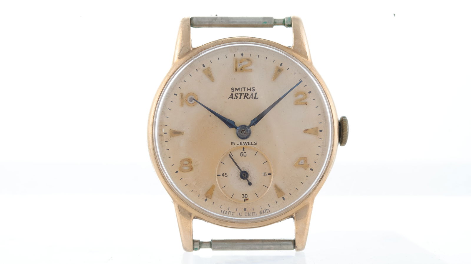 Vintage Smiths Astral 9ct Gold Wristwatch: Brand: Smiths Model Name: Astral Movement type: Manual Wind Movement features: Smiths signed movement Dial shape: Circular Dial colour: White patina Dial features: Arabic and baton hour markers, subsi