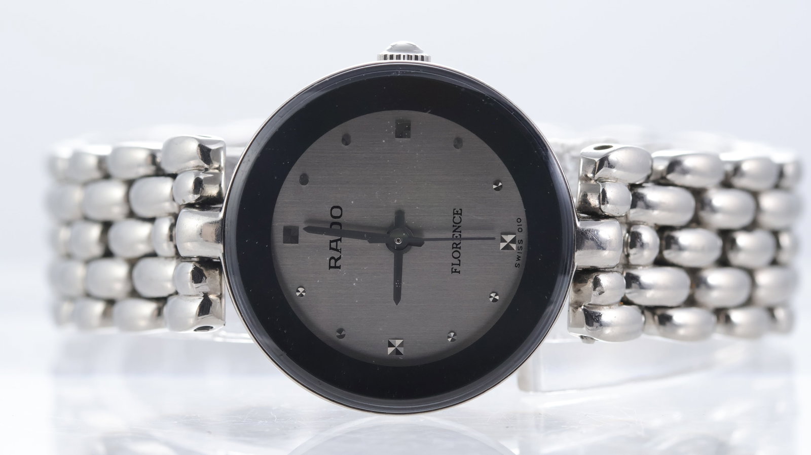 Ladies Rado Florence Quartz Ref 318.3744.4: Brand: Rado Model Name: Florence Reference: 318.3744.4 Movement type: Quartz Dial shape: Circular Dial colour: grey Dial features: dot hour markers Case size: 23mm Case material: Stainless steel Case