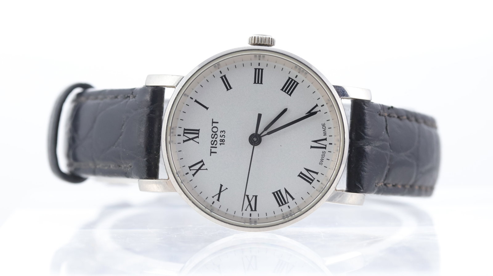 Tissot Everytime Ref T109210A: Brand: Tissot Model Name: Everytime Reference: T109210A Movement type: Quartz Dial shape: Circular Dial colour: White Dial features: Roman numerals Bezel: Smooth bezel Case size: 30mm Case material: