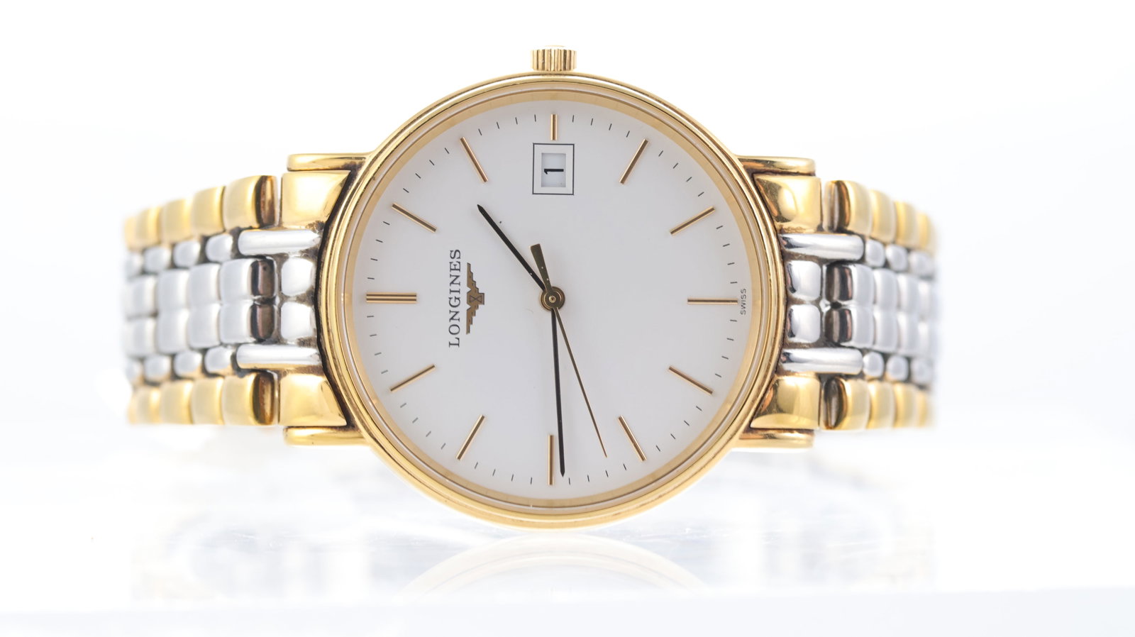 Longines Presence Ref L4.720.2: Brand: Longines Model Name: Presence Reference: L4.720.2 Movement type: Quartz Dial shape: Circular Dial colour: White Dial features: Baton hour markers, quickset date aperture