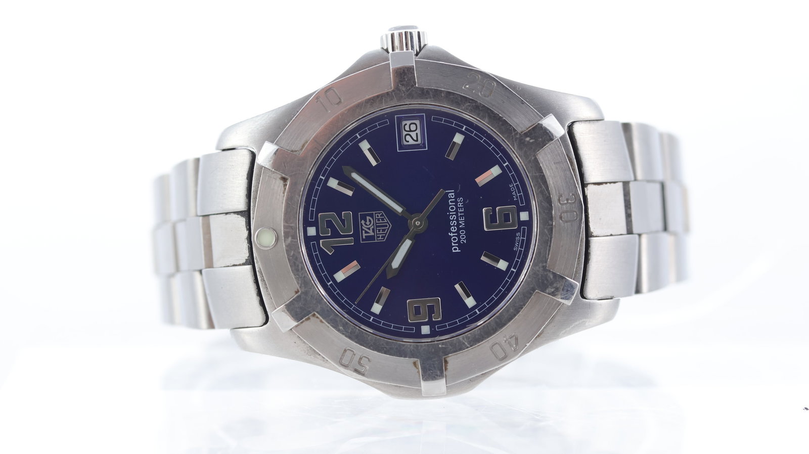 Tag Heuer Professional Ref WN1112: Brand: Tag Heuer Model Name: Professional Reference: WN1112 Movement type: Quartz Dial shape: Circular Dial colour: Sunburst, Blue Dial features: Applied baton hour markers wit