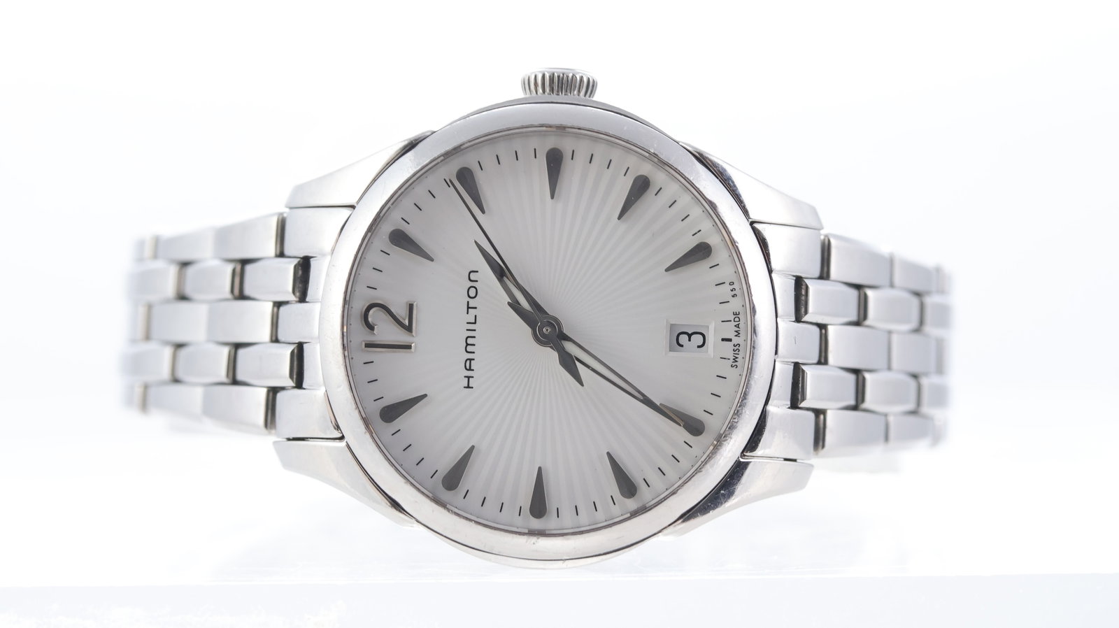 Hamilton Jazzmaster Ref H422110: Brand: Hamilton Model Name: Jazzmaster Reference: H422110 Movement type: Quartz Dial shape: Circular Dial colour: Silver Dial features: Spiral effect dial, baton hour markers,
