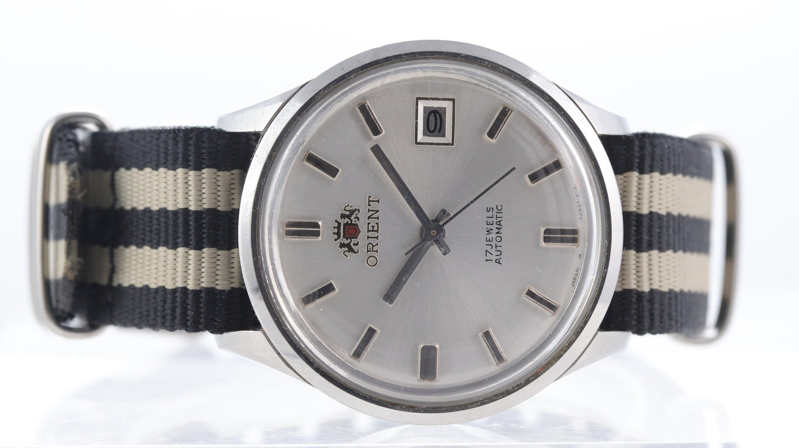 Orient Automatic Circa 1970's: Brand: Orient Model Name: Automatic Movement type: Automatic Year: Circa 1970's Dial shape: Circular Dial colour: Silver Dial features: Baton hour markers, date aperture at 3 o