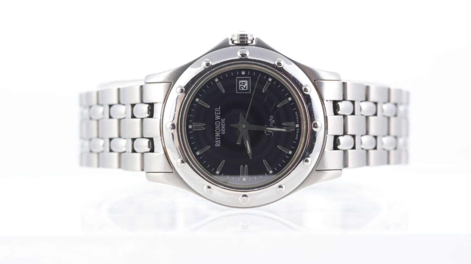 Ladies Raymond Weil Tango Ref 5390: Brand: Raymond Weil Model Name: Tango Reference: 5390 Movement type: Quartz Dial shape: Circular Dial colour: Black Dial features: Silver baton hour markers. Date aperture at 3