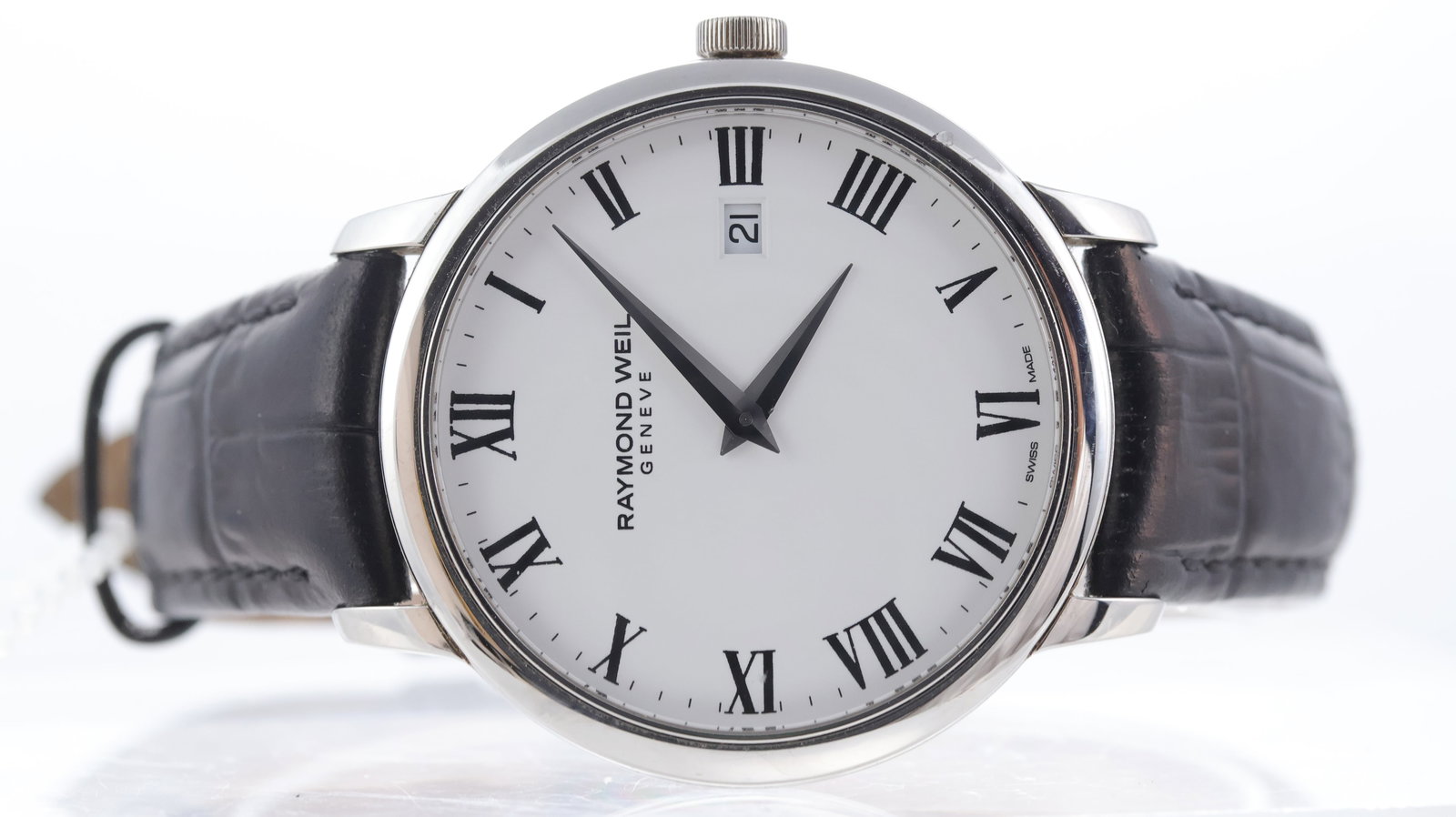 Raymond Weil Tango Ref 5488: Brand: Raymond Weil Model Name: Tango Reference: 5488 Movement type: Quartz Dial shape: Circular Dial colour: White Dial features: Roman numerals, quickset date aperture at 3 o