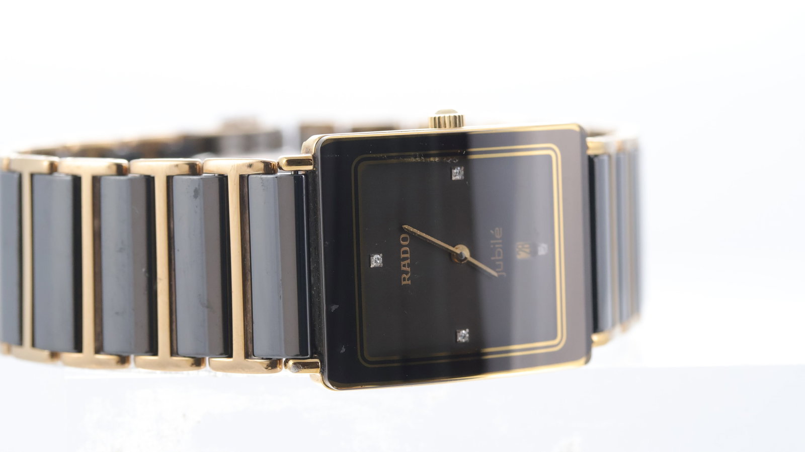 Rado Diastar Jubile Ref 160.0281.3N: Brand: Rado Model Name: Diastar Jubile Reference: 160.0281.3N Movement type: Quartz Dial shape: Rectangular Dial colour: Grey Dial features: Gold tone watch hands with dot diam