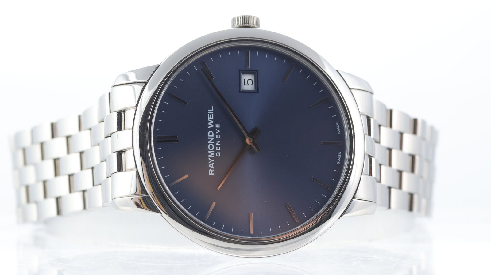 Raymond Weil Toccata Ref 5485: Brand: Raymond Weil Model Name: Toccata Reference: 5485 Movement type: Quartz Dial shape: Circular Dial colour: Blue Dial features: Silver hands and baton hour markers. Quick set date aperture at 3