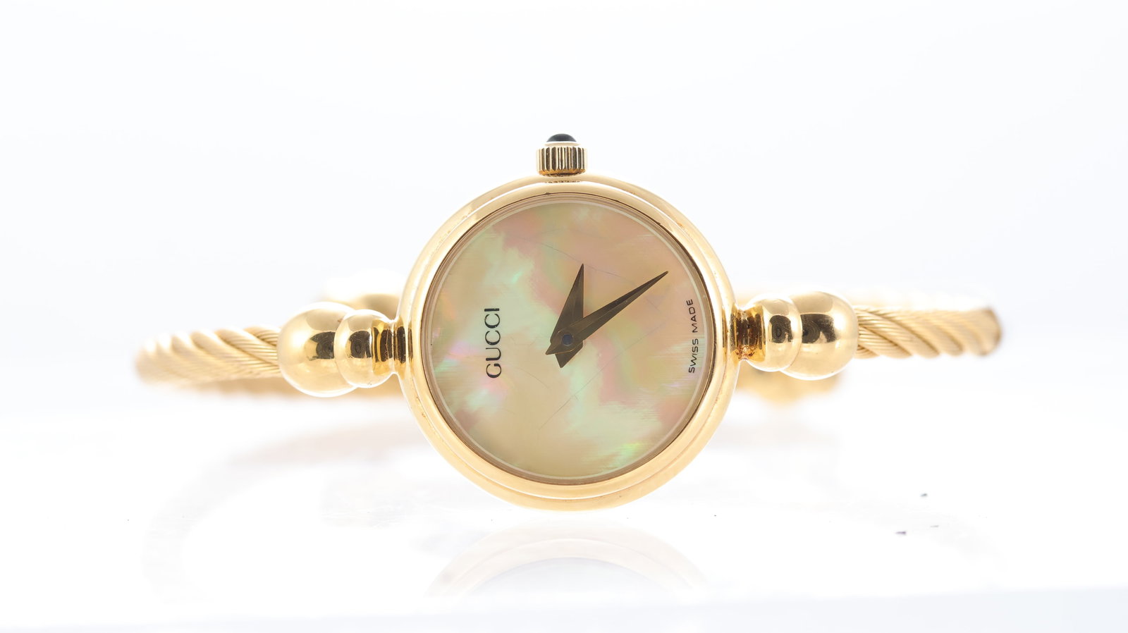 Gucci Bangle Ref 2700.2.L: Brand: Gucci Model Name: Bangle Reference: 2700.2.L Movement type: Quartz Dial shape: Circular Dial colour: Mother of Pearl Dial features: Gold watch hands. Case size: 20mm Case material: Gold plated