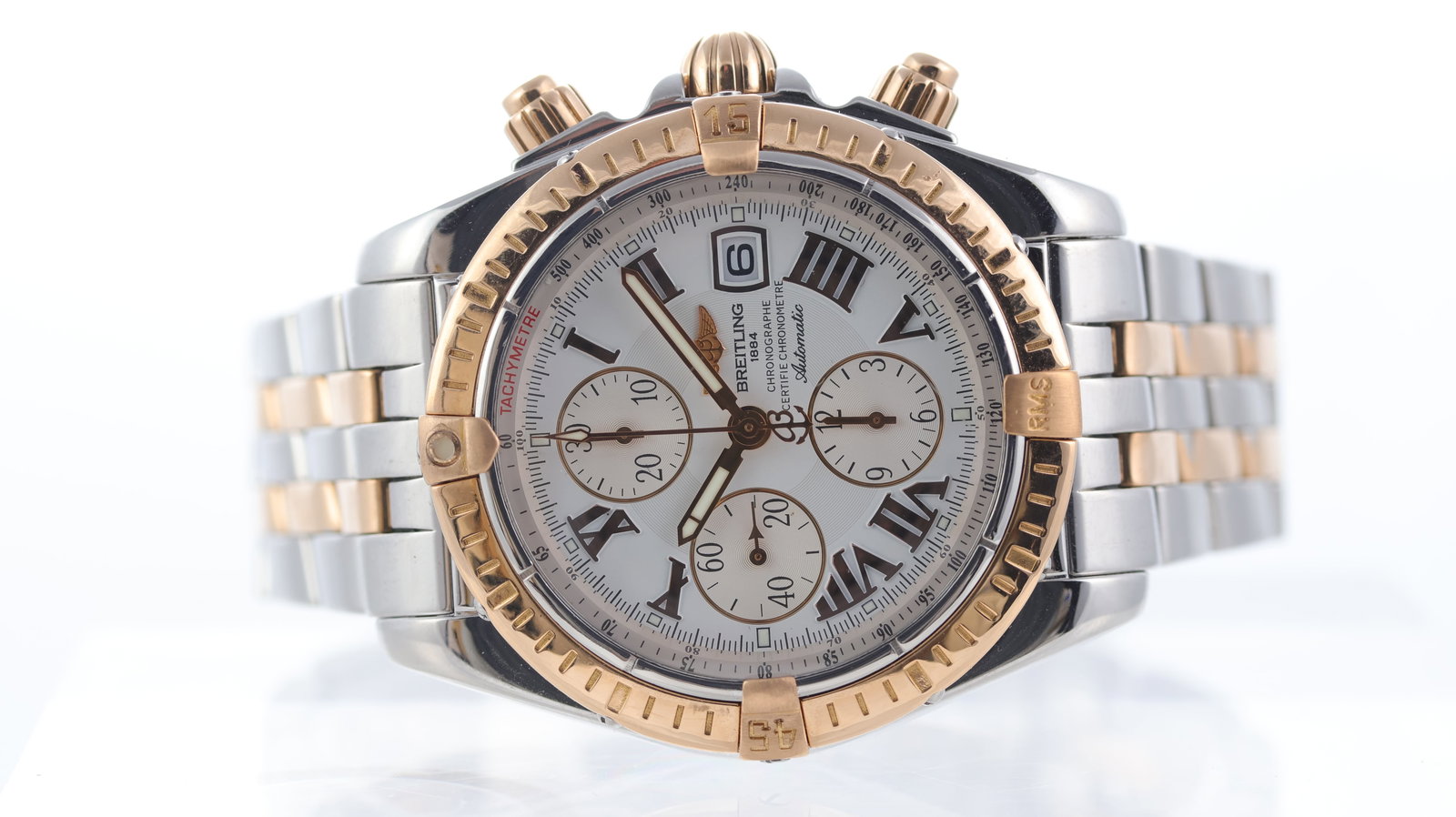 Breitling Chronomat Evolution Ref B13356 Steel and Rose Gold: Brand: Breitling Model Name: Chronomat Evolution Reference: B13356 Movement type: Automatic Movement calibre: ETA 7750 Dial shape: Circular Dial colour: Silver Dial features: Applied rose gold roman n