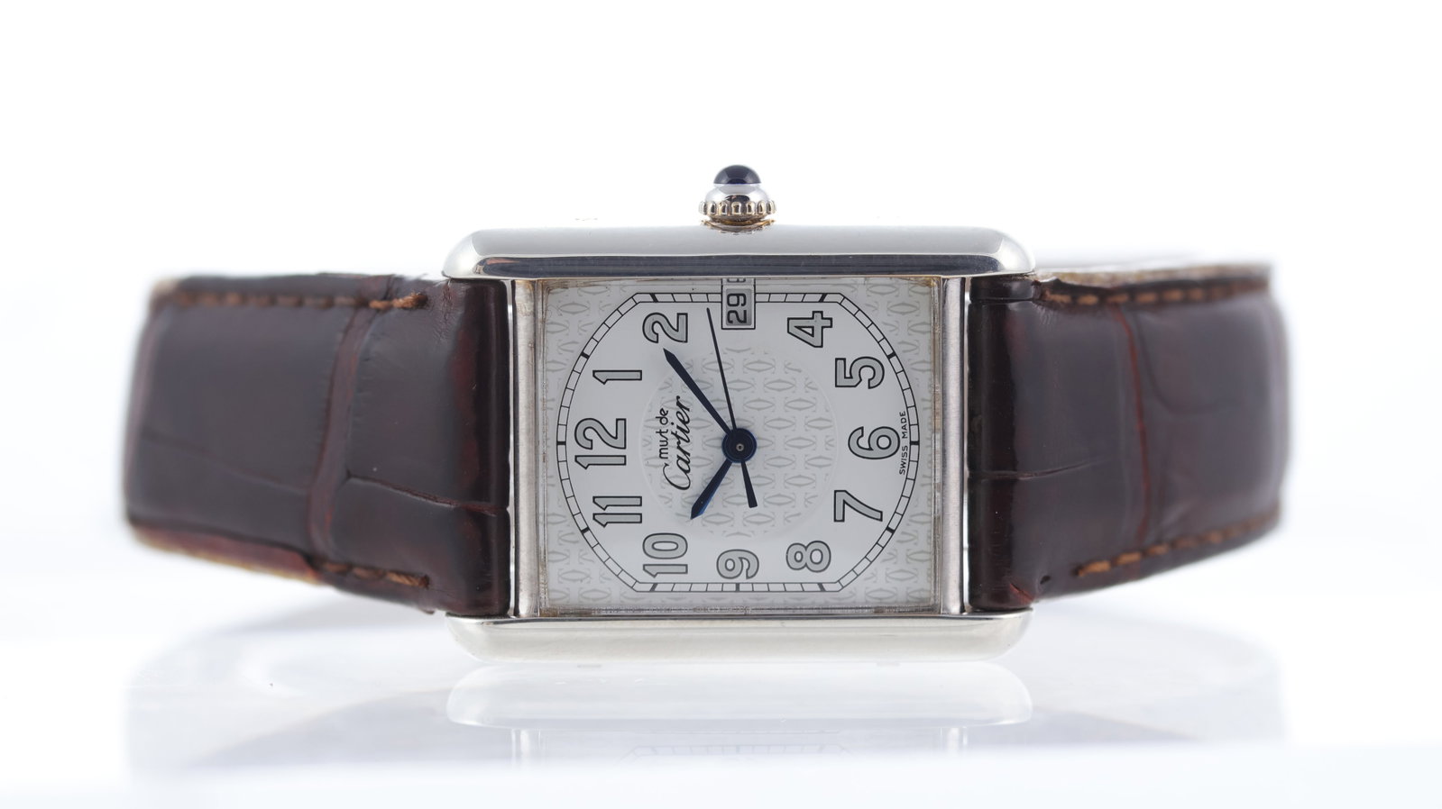 Cartier Must De Cartier Tank Ref 2413: Brand: Cartier Model Name: Must De Cartier Tank Reference: 2413 Movement type: Quartz Dial shape: Rectangular Dial colour: White Dial features: Arabic numerals, quickset date aperture at 3 o'clock, ce