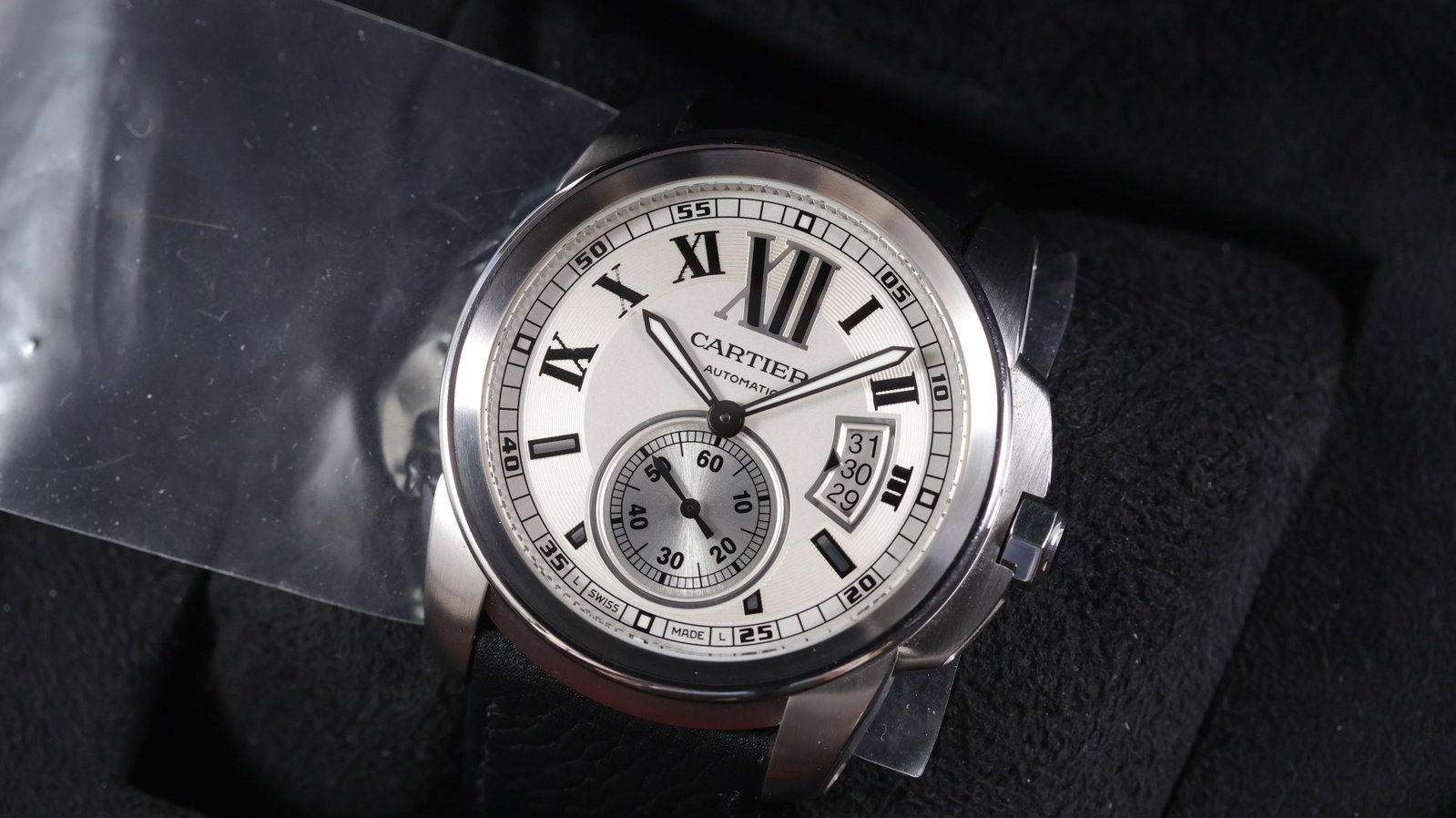 Cartier Calibre De Cartier Ref 3389 with Box and Papers: Brand: Cartier Model Name: Calibre De Cartier Reference: 3389 Movement type: Automatic Movement calibre: Cartier 1904-PS MC Box: Full Box Papers features: Pre-owned, undated Dial shape: Circular Dial 