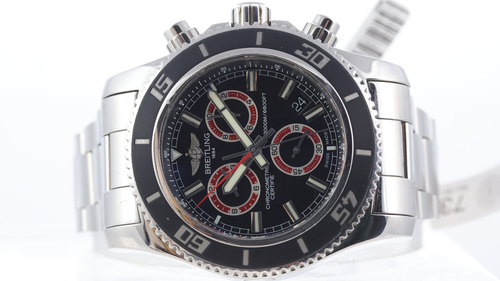 Breitling Superocean Ref A73310: Brand: Breitling Model Name: Superocean Reference: A73310 Movement type: Quartz Dial shape: Circular Dial colour: Black Dial features: three subdials, red accents, luminous hands, red center seconds B