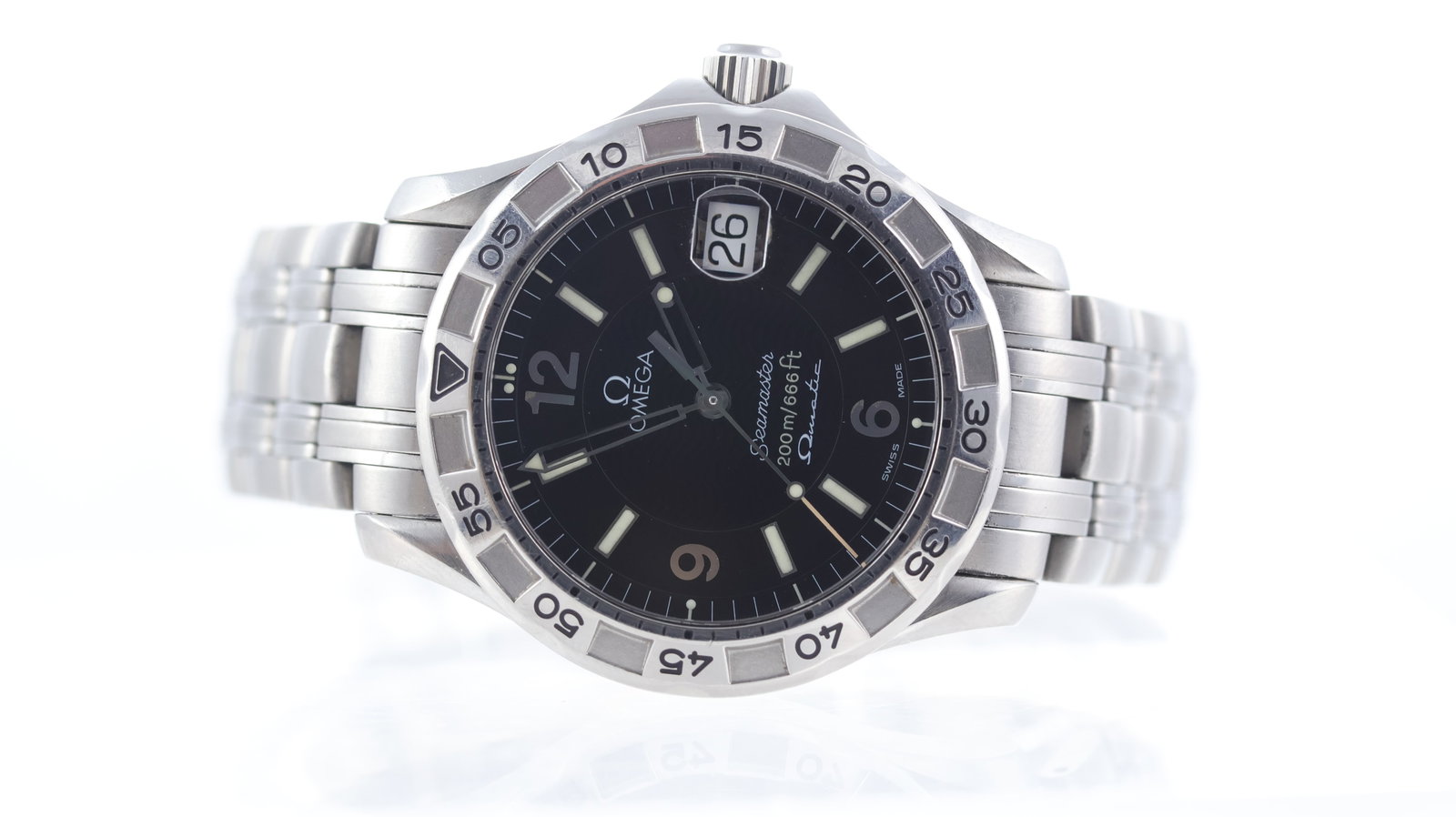 Omega Seamaster Omegamatic Hybrid Circa 1990's: Brand: Omega Model Name: Seamaster Omegamatic Movement features: Quartz movement with an automatic rotor and winding function. Dial shape: Circular Dial colour: Black Dial features: Baton hour markers