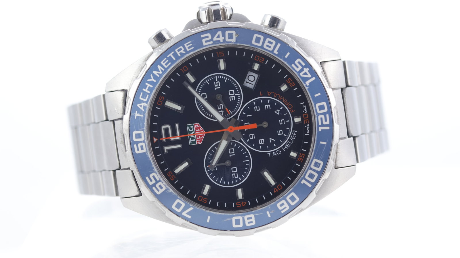Tag Heuer Formula 1 Ref CAZ1014: Brand: Tag Heuer Model Name: Formula 1 Reference: CAZ1014 Movement type: Quartz Dial shape: Circular Dial colour: Blue Dial features: Three sub dials, Orange center seconds hand, luminous hour markers