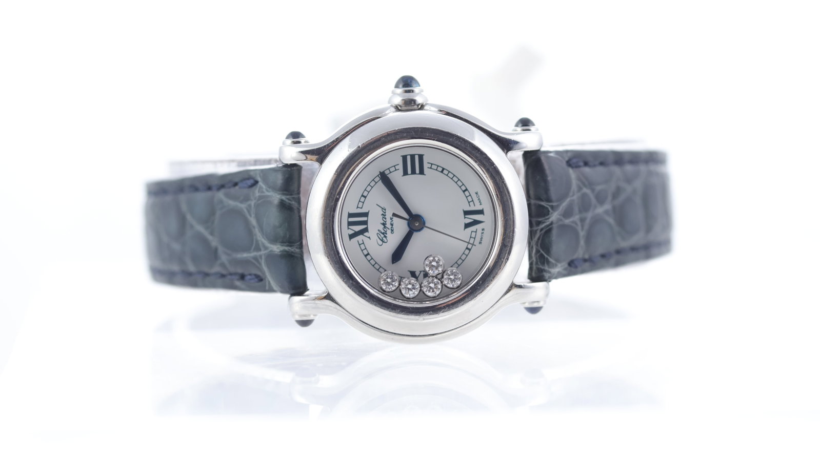 Chopard Happy Sport Ref 8245: Brand: Chopard Model Name: Happy Sport Reference: 8245 Movement type: Quartz Dial shape: Circular Dial colour: White Dial features: Roman numerals, diamonds Bezel: Smooth Case size: 26mm Case material