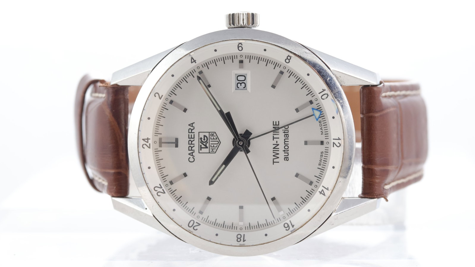 Tag Heuer Carrera Twin Time Automatic Ref WV2116: Brand: Tag Heuer Model Name: Carrera Twin Time Reference: WV2116 Movement type: Automatic Movement calibre: Tag Heuer 7 Dial shape: Circular Dial colour: Silver Dial features: Baton hour markers. GMT 