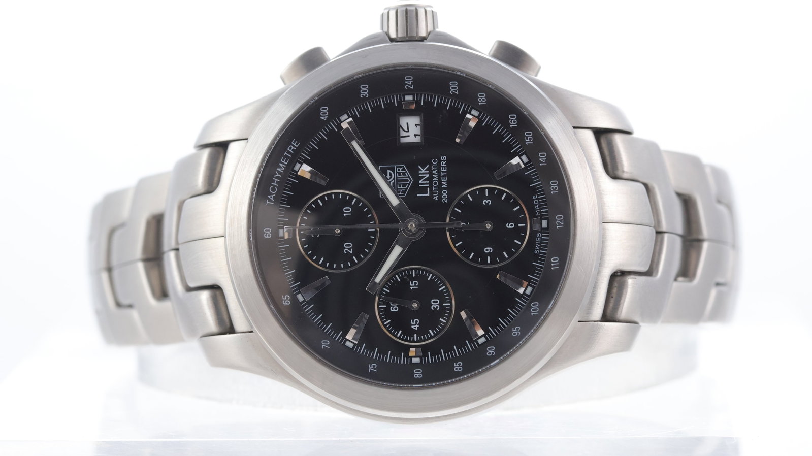 Tag Heuer Link Ref CJF2110: Brand: Tag Heuer Model Name: Link Reference: CJF2110 Movement type: Automatic Dial shape: Circular Dial colour: Black Dial features: Applied hour markers. Date aperture at 3 o'clock. Case size: 41mm C