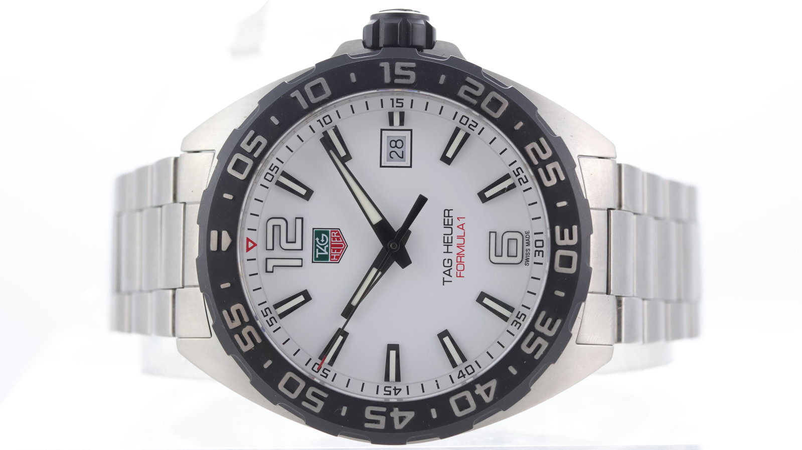 Tag Heuer Formula 1 Ref WAZ1111: Brand: Tag Heuer Model Name: Formula 1 Reference: WAZ1111 Movement type: Quartz Dial shape: Circular Dial colour: White Dial features: Baton hour markers, quickset date aperture at 3 o'clock Bezel: Bl
