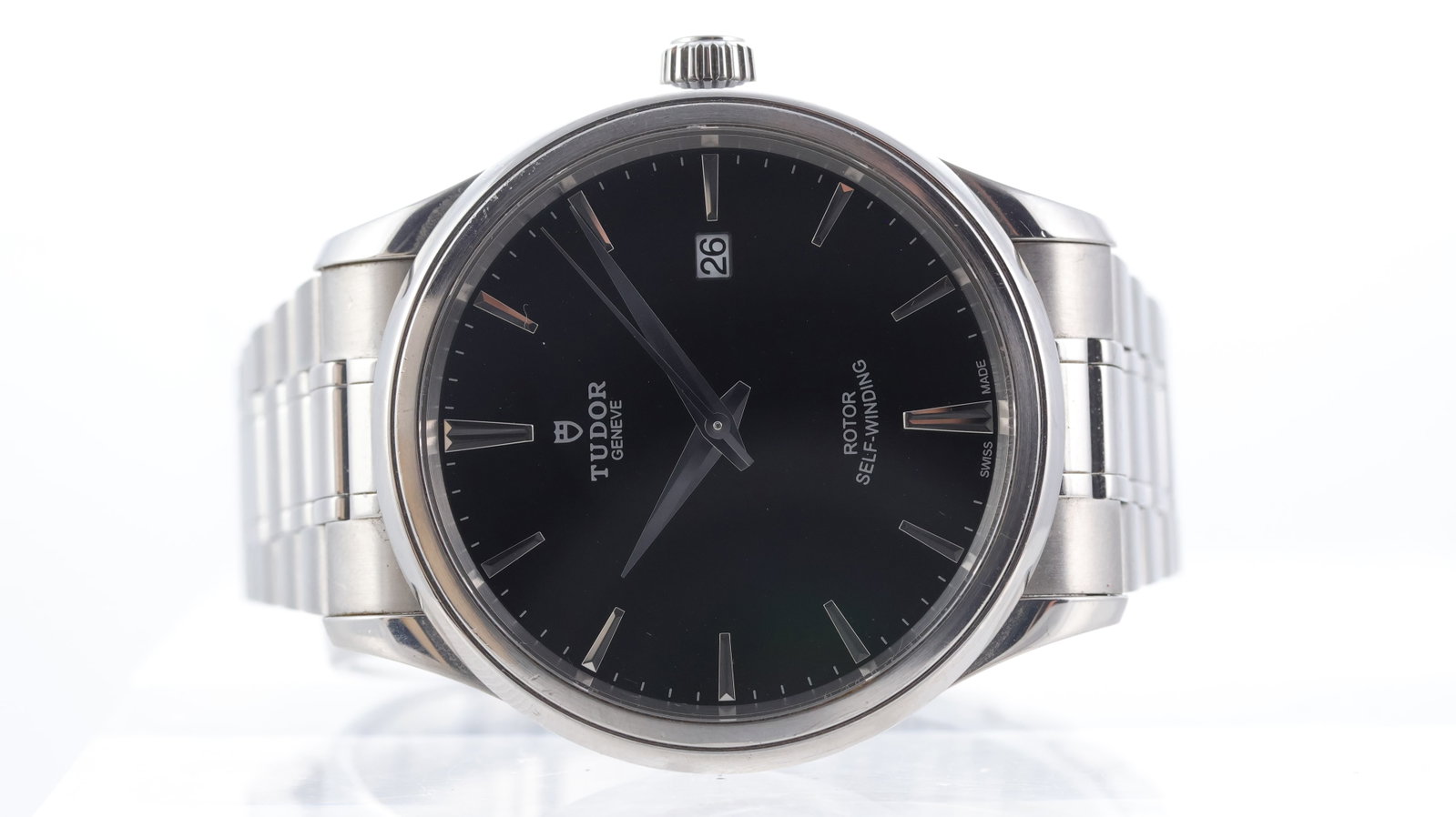 Tudor Style Ref 12700: Brand: Tudor Model Name: Style Reference: 12700 Movement type: Automatic Dial shape: Circular Dial colour: Black Dial features: Baton hour markers, quickset date aperture at 3 o'clock Bezel: Smooth Ca
