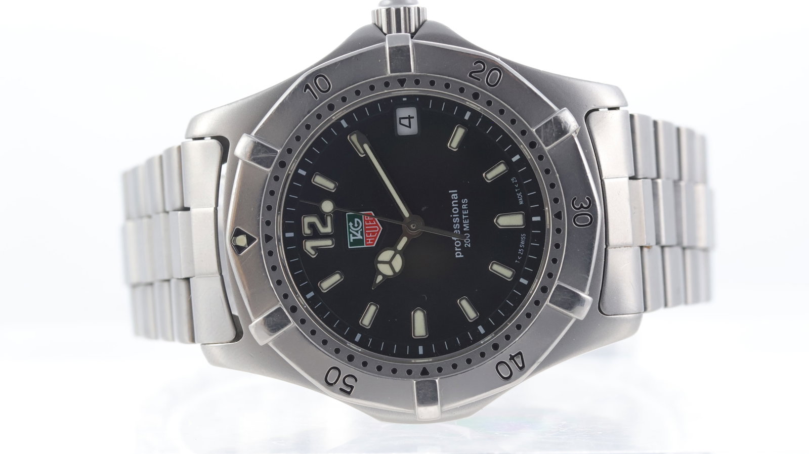 Tag Heuer Professional 2000 Ref WK1110: Brand: Tag Heuer Model Name: Professional 2000 Reference: WK1110-0 Movement type: Quartz Dial shape: Circular Dial colour: Black Dial features: Silver/Lume hands and hour markers. Date aperture at 3