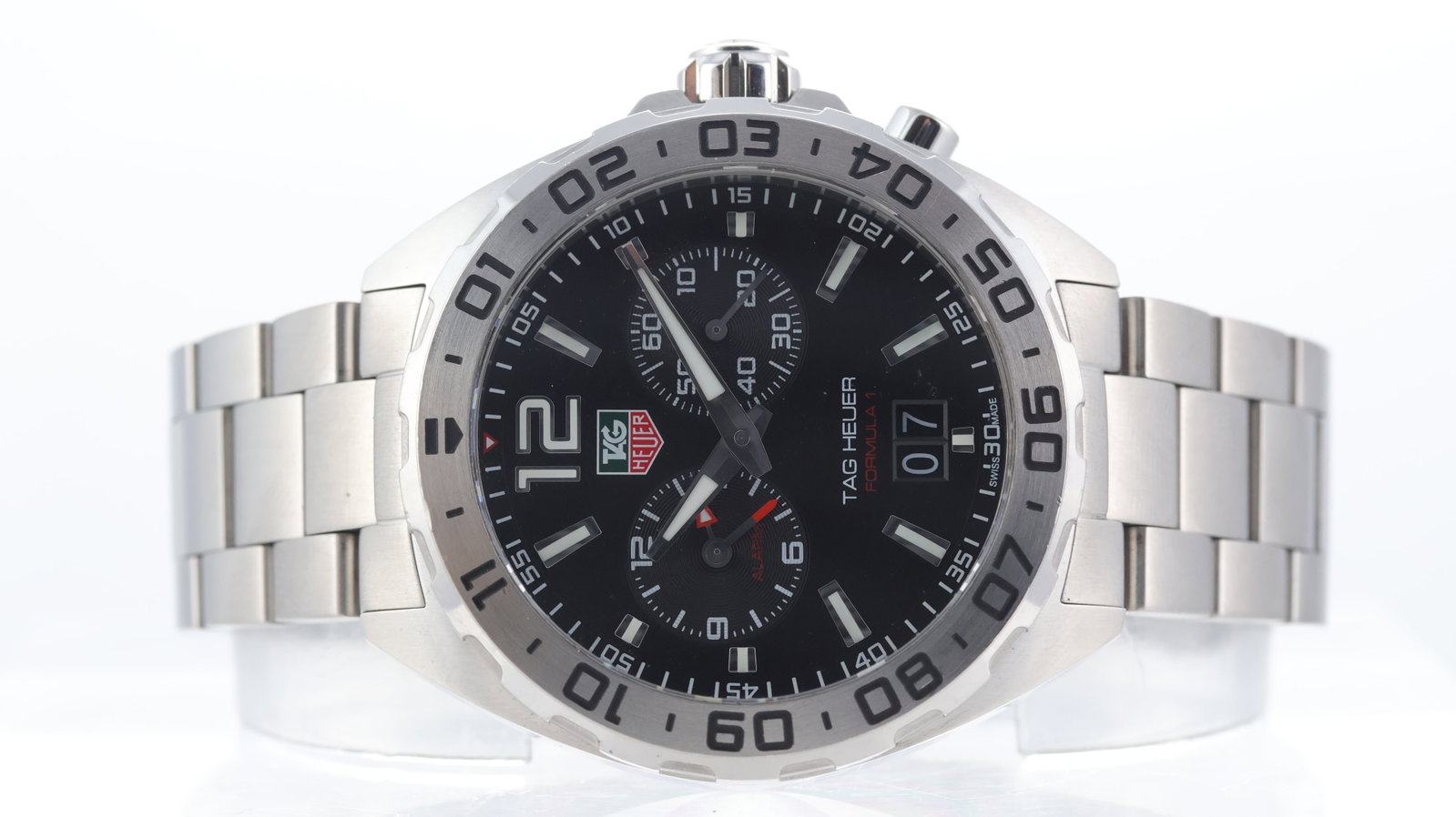 Tag Heuer Formula 1 Alarm Ref WAZ111A: Brand: Tag Heuer Model Name: Formula 1 Alarm Reference: WAZ111A Movement type: Quartz Movement calibre: Tag Heuer Ronda 4120.B Dial shape: Circular Dial colour: Black Dial features: Twin sub dials,