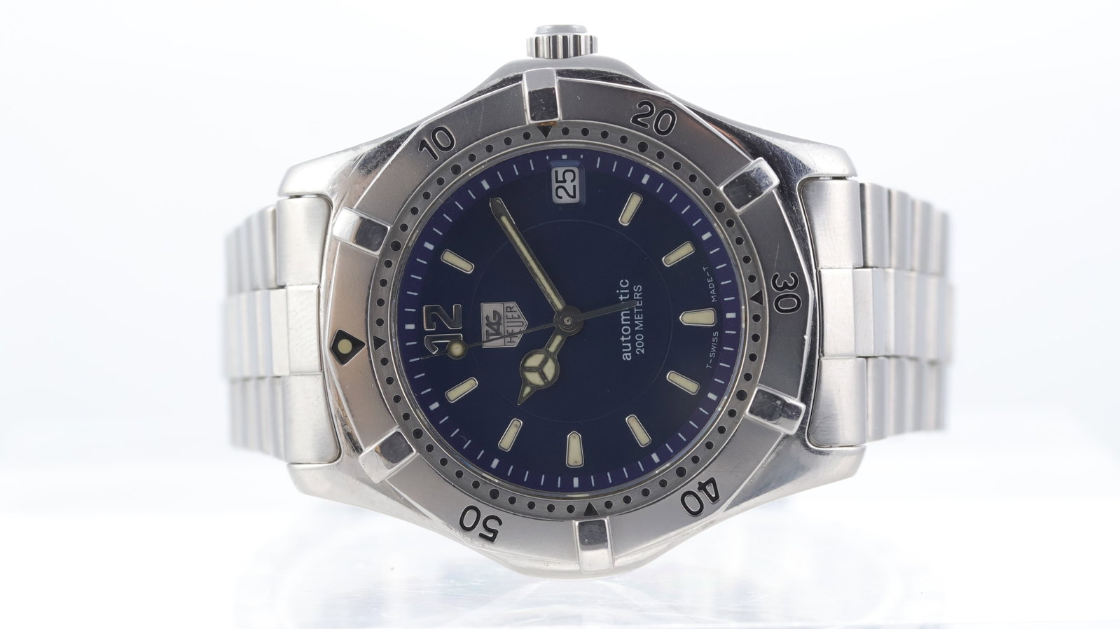 Tag Heuer 2000 Series Ref WK21170: Brand: Tag Heuer Model Name: 2000 Series Reference: WK21170 Movement type: Automatic Dial shape: Circular Dial colour: Sunburst, blue Dial features: Silver/Lume hands and hour markers. Date aperture