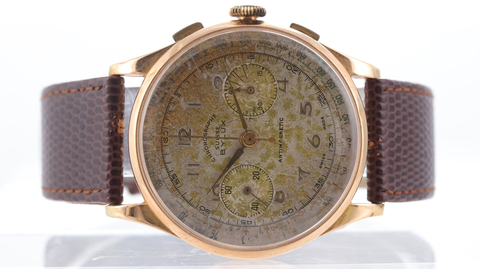 Vintage Bylux Chronographe 18ct gold Circa 1950's: Brand: Bylux Model Name: Chronographe Movement type: Manual Wind Movement features: Landeron 48 Year: Circa 1950's Dial shape: Circular Dial colour: Silver Patina Dial features: gilt hands and arabic 