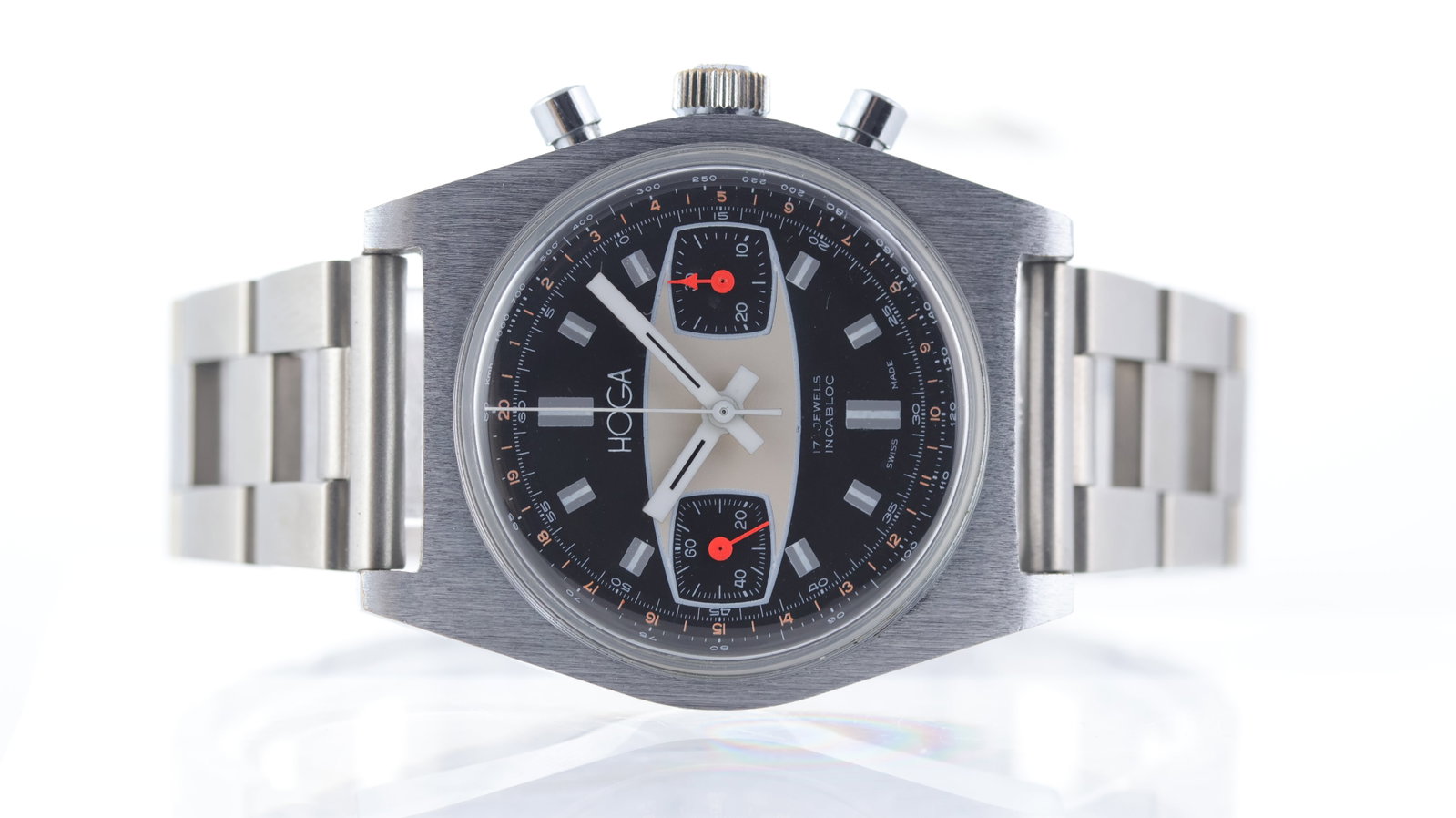 Hoga 'Surfboard' Ref 2318 Circa 1960's: Brand: Hoga Model Name: 'Surfboard' Reference: 2318 Movement type: Manual Wind Movement features: Hoga Valjoux 7733 Year: Circa 1960's Dial shape: Circular Dial colour: Black Dial features: Racing dia