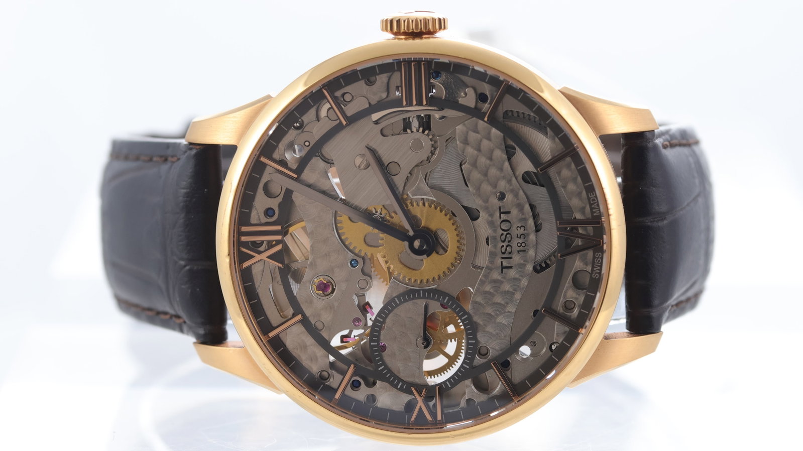 Tissot Chemin Des Tourelles Manual Wind Ref T099405A: Brand: Tissot Model Name: Chemin Des Tourelles Reference: T099405A Movement type: Manual Wind Dial shape: Circular Dial colour: Skeleton Dial features: Rose roman numeral hour markers. Bezel: Smooth