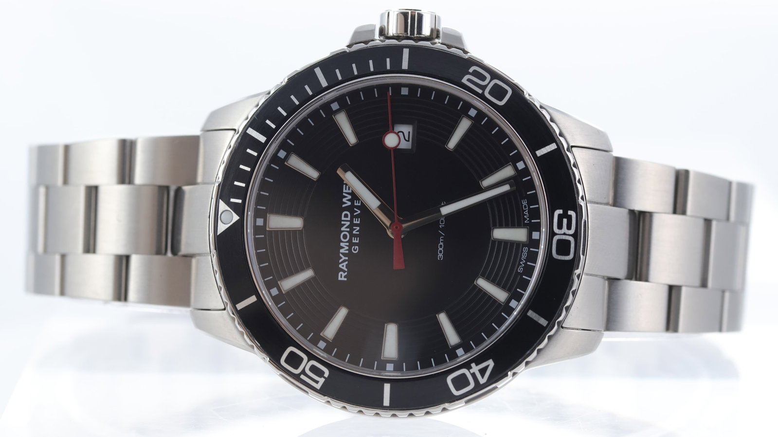 Raymond Weil Tango Quartz Ref 8260: Brand: Raymond Weil Model Name: Tango Reference: 8260 Movement type: Quartz Dial shape: Circular Dial colour: Black Dial features: Applied silver batons with lume inserts, red seconds hand, date