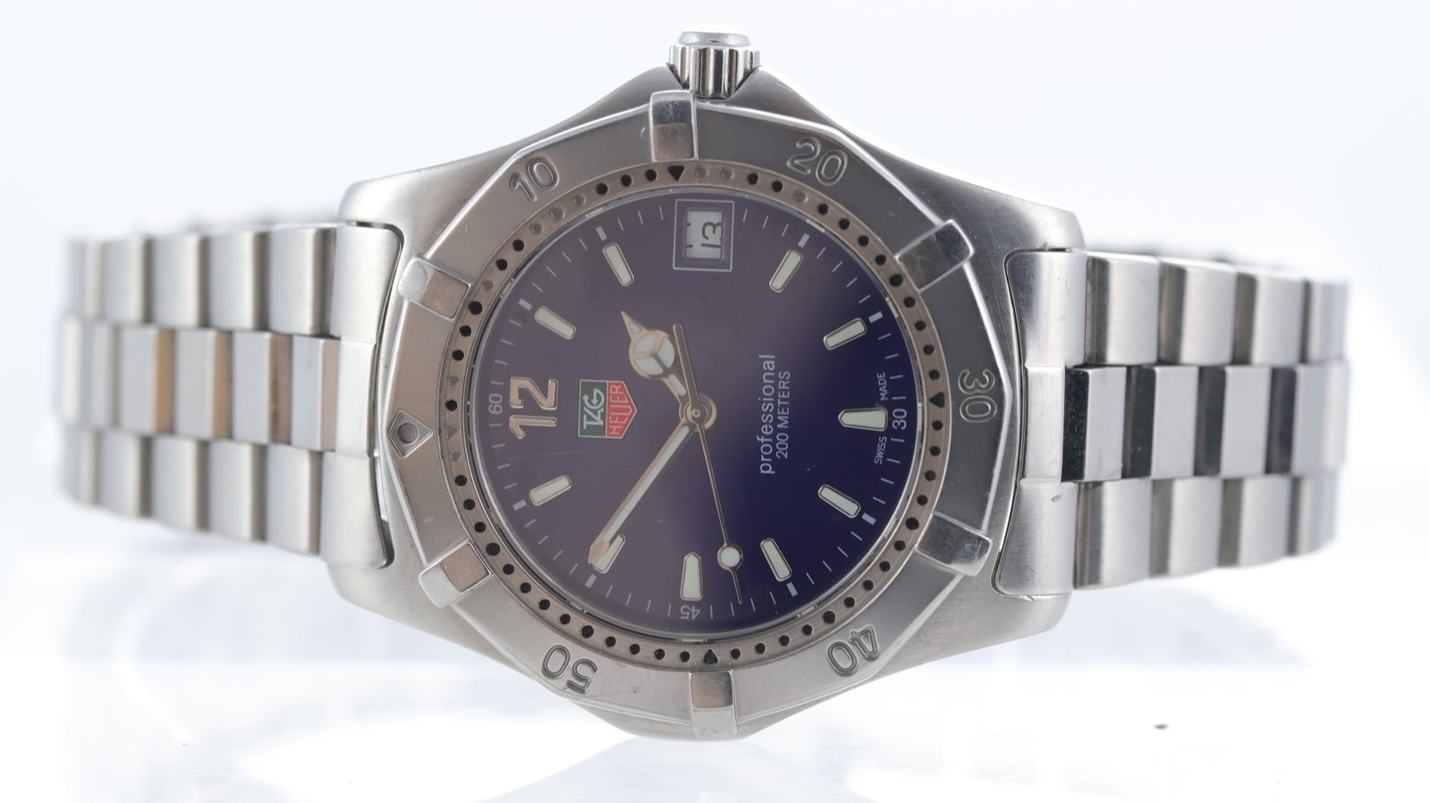 Tag Heuer Professional Ref WK1113-0: Brand: Tag Heuer Model Name: Professional Reference: WK1113-0 Movement type: Quartz Dial shape: Circular Dial colour: Blue Dial features: Luminous markers and hands, date aperture Bezel: Stainless